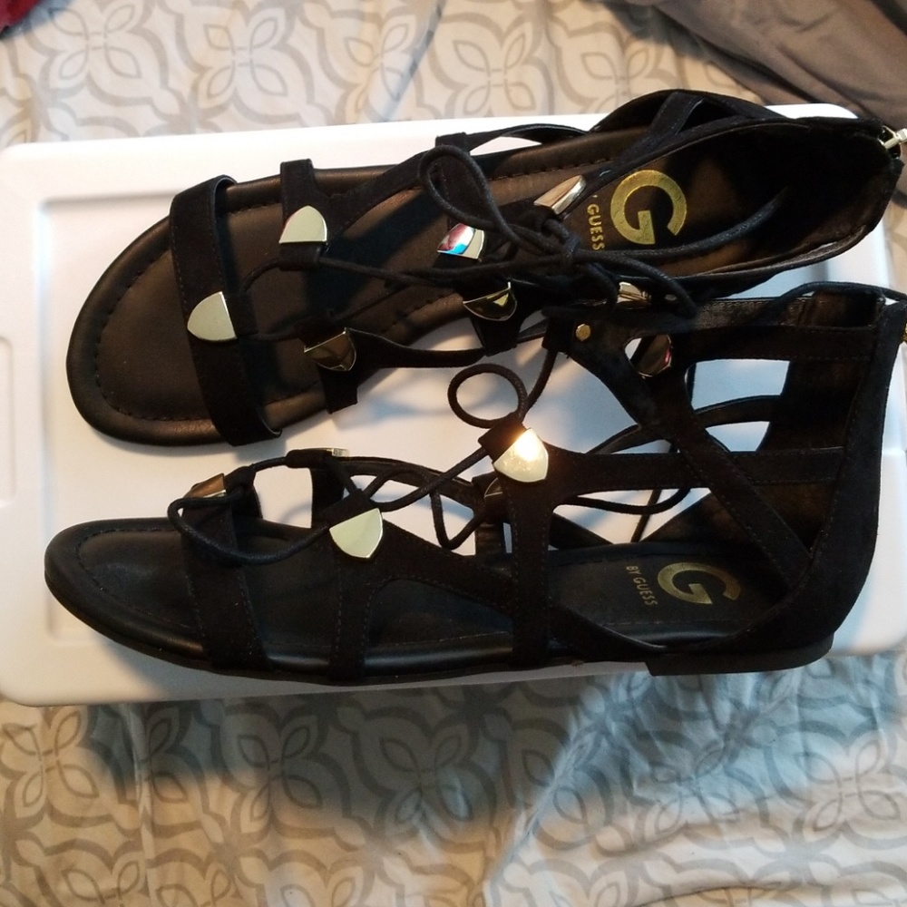 Guess black and gold strappy sandals